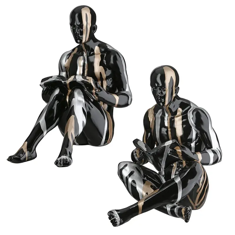 Buchstützen – Personenform, Schwarze Metalloptik, Silberne Linien, Höhe 22,5 cm - Drip | Gilde